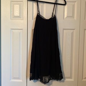 Black shift dress with lace detail on top and bottom